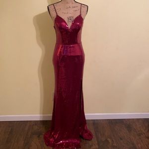 Red long elegant dress with thigh slit.